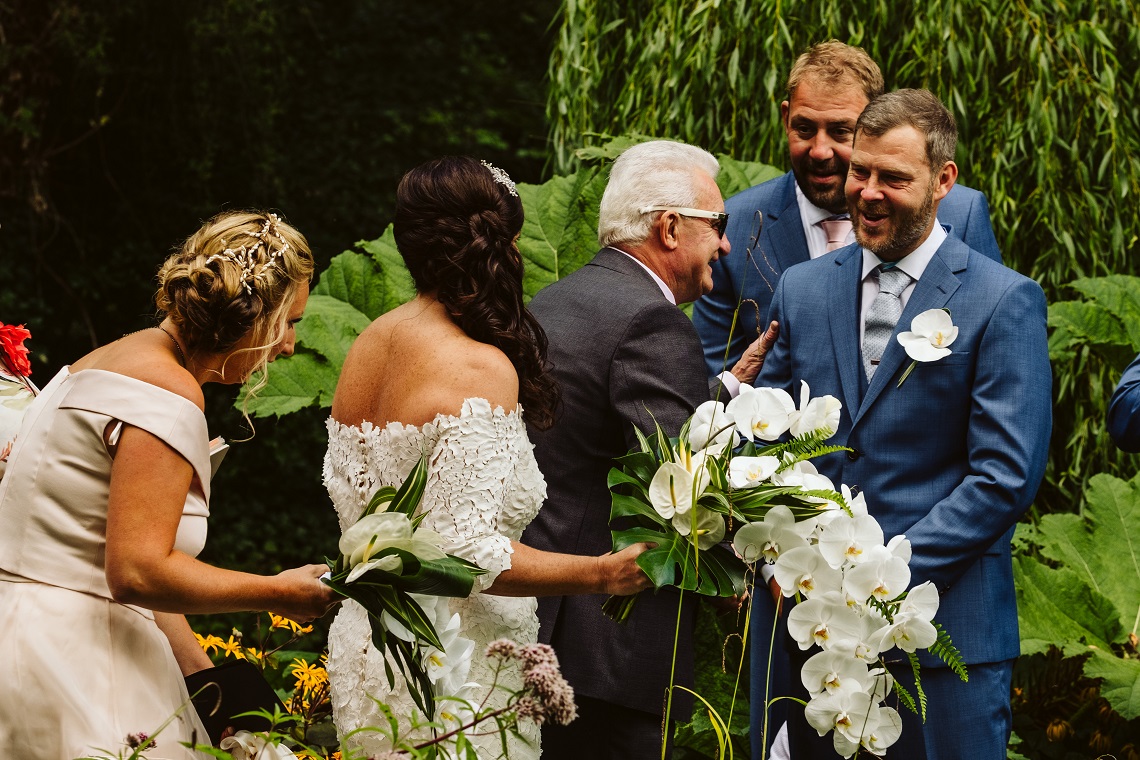 dad shaking grooms hand