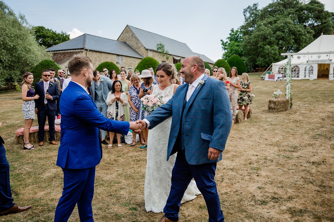 dad greeting groom